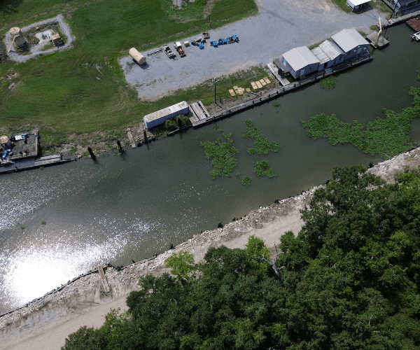 Aerial view of a cleared industrial site following dismantling and site remediation activities.