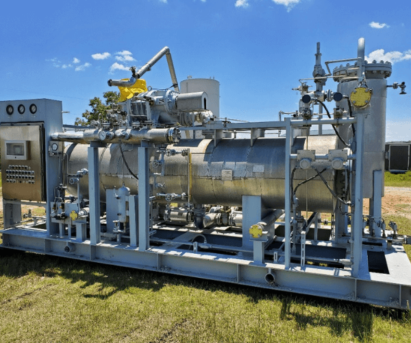 Horizontal process vessel and piping skid removed from an energy facility as part of a material recycling and equipment recovery operation.